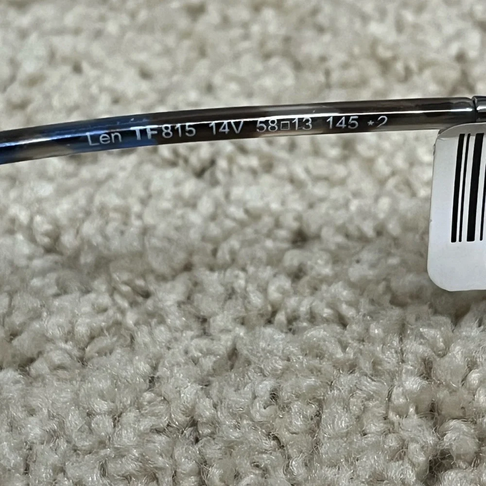 Tom Ford Silver Frame Aviator Sunglasses with Dark Gray Lenses